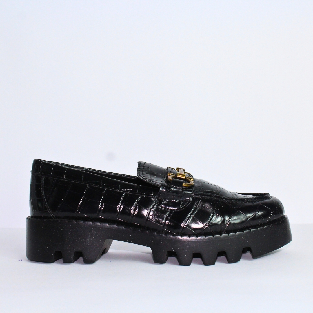 Paquete de 6 pares de Mocasin color negro de mujer marca Brunella mterial charol drilo